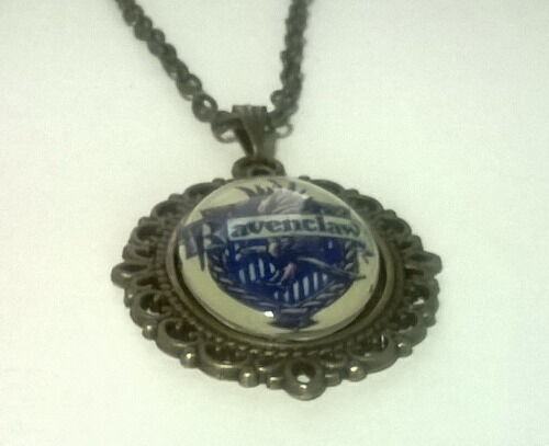 Медальйон Harry Potter Ravenclaw 4х3 см. Медальйон Harry Potter Ravenclaw 4х3 см.